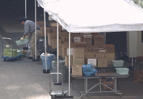 U.S. Embassy staff sorting mail taking antibiotics